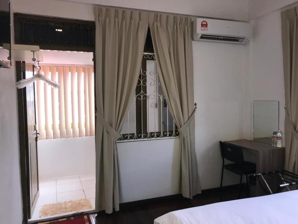 Natol Homestay - London Кучинг Экстерьер фото